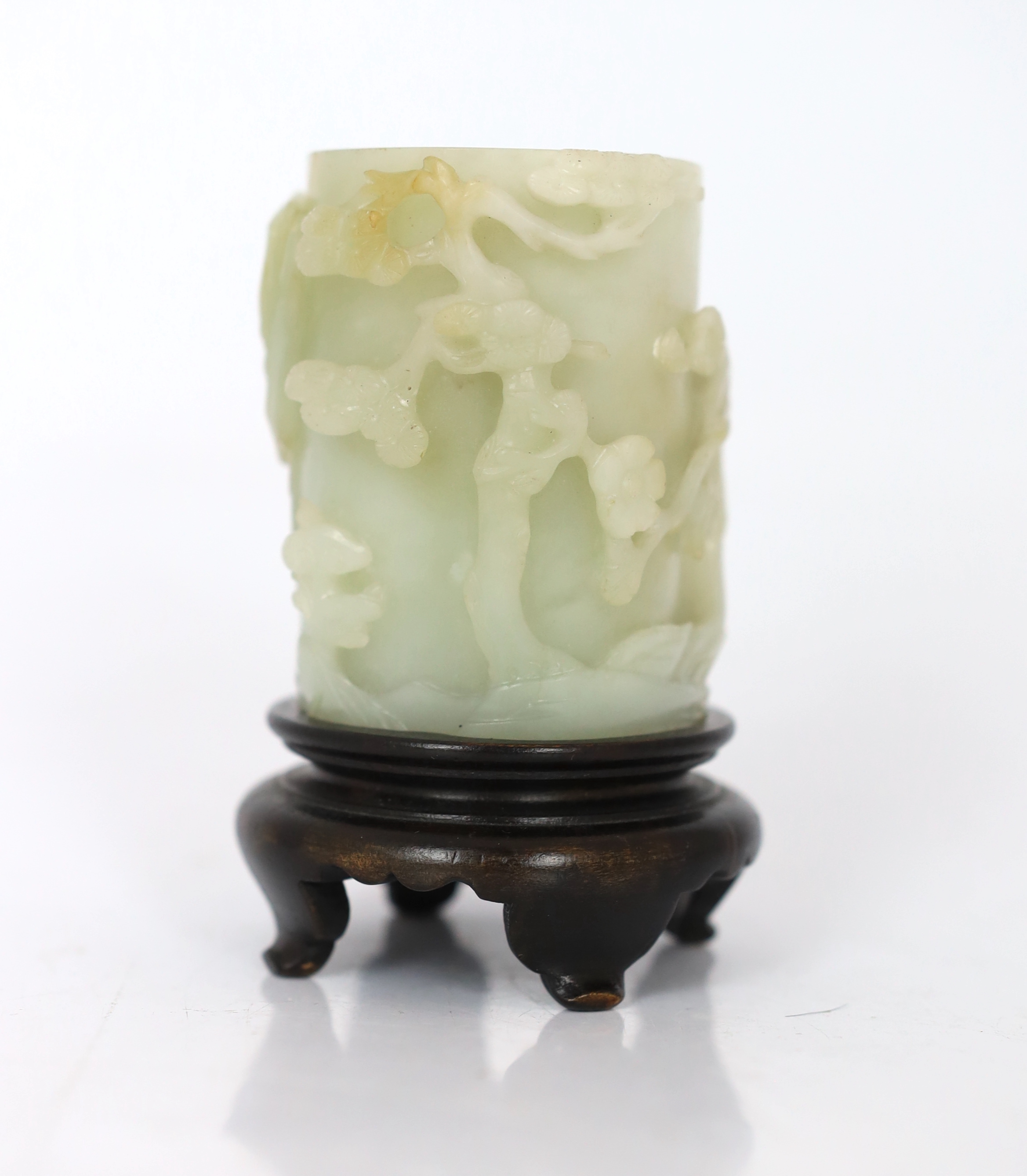 A Chinese pale celadon and russet jade brush pot, bitong, 18th century